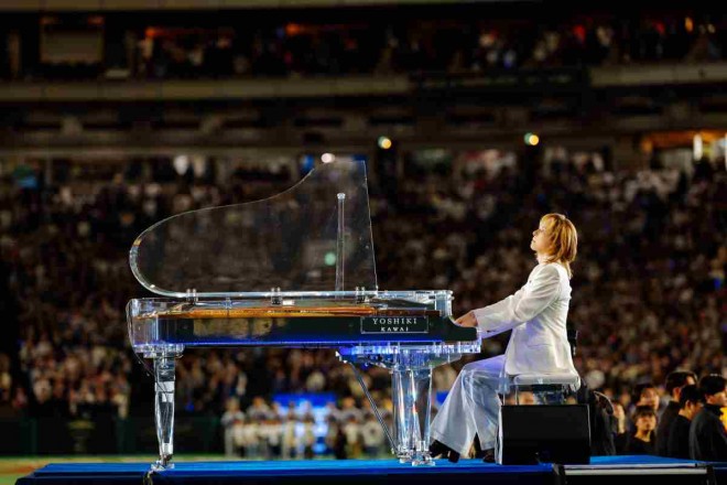 YOSHIKI delivers a mesmerizing piano performance at the MLB Opening Game in Tokyo Dome.