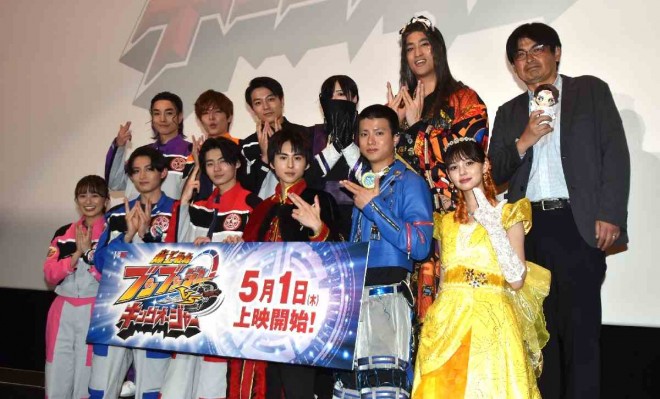 Full cast and director Hiroyuki Katō attend the premiere event for Boonboomger vs King-Ohger in full costume