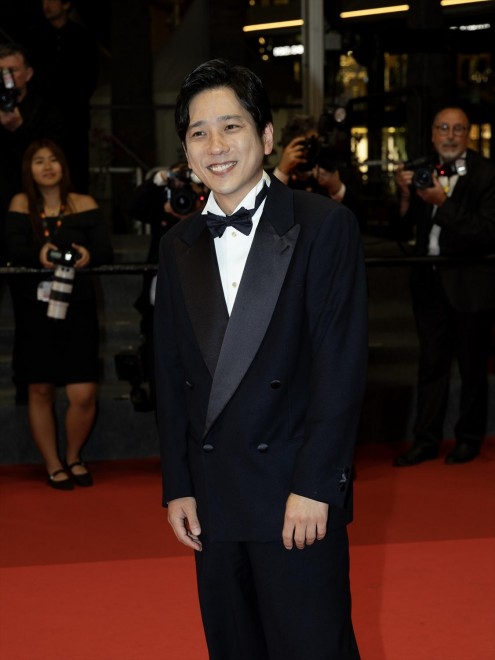 Kazunari Ninomiya walks the red carpet at the 78th Cannes Film Festival