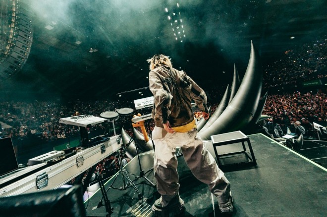 YOASOBI performing during their European debut tour in Barcelona and London.