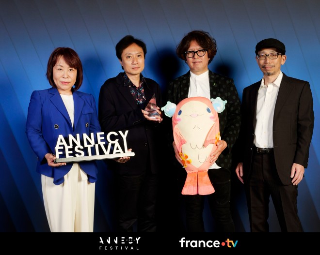 ChaO director Yasuhiro Aoki celebrates the Jury Prize win at Annecy 2025 with the creative team