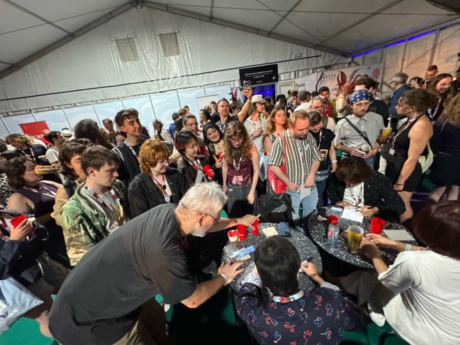 ChaO director Yasuhiro Aoki celebrates the Jury Prize win at Annecy 2025 with the creative team