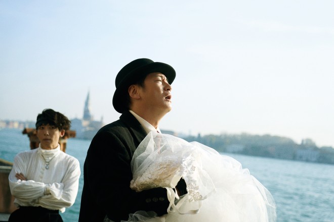 Maria (Tina Tamashiro) stands in a radiant white wedding dress during a pivotal scene from Thus Spoke Kishibe Rohan: At a Confessional, filmed at the historic San Rocco Church in Venice.