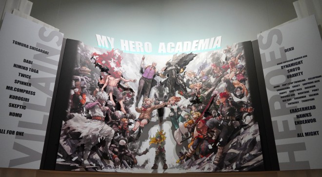 A powerful scene from the "My Hero Academia Original Art Exhibition" (Zone 4), capturing the final battle between heroes and villains. Featuring special illustrations by Kohei Horikoshi.