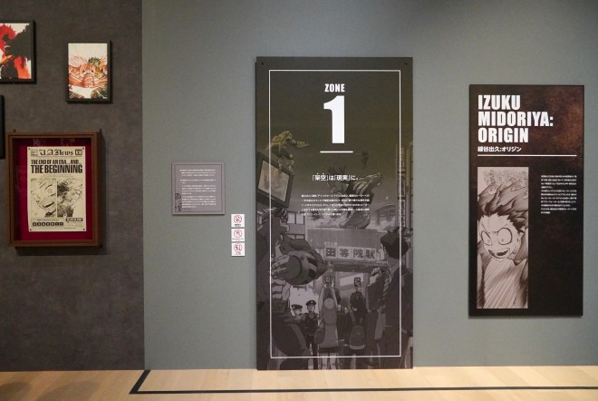 A powerful scene from the "My Hero Academia Original Art Exhibition" (Zone 4), capturing the final battle between heroes and villains. Featuring special illustrations by Kohei Horikoshi.