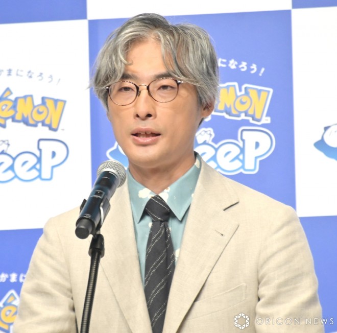 Takato Utsunomiya at Pokémon Sleep 2nd anniversary event in Tokyo receiving Guinness World Record certificate