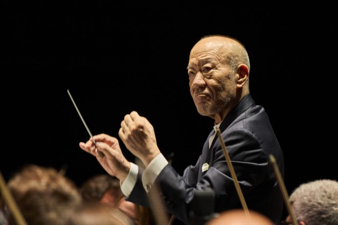Joe Hisaishi conducts the Royal Philharmonic Orchestra at the Studio Ghibli Film Concert in Tokyo Dome.