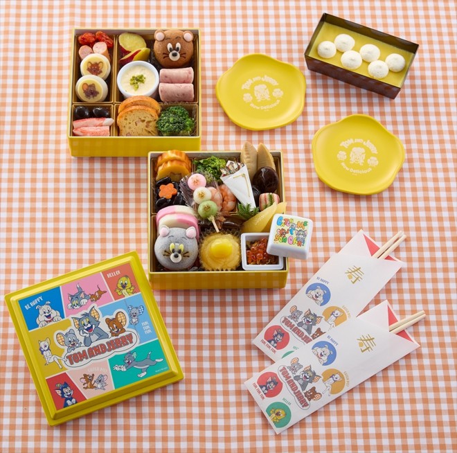 2026 two-tier Tom and Jerry Osechi set featuring traditional New Year dishes and cheese-inspired items.