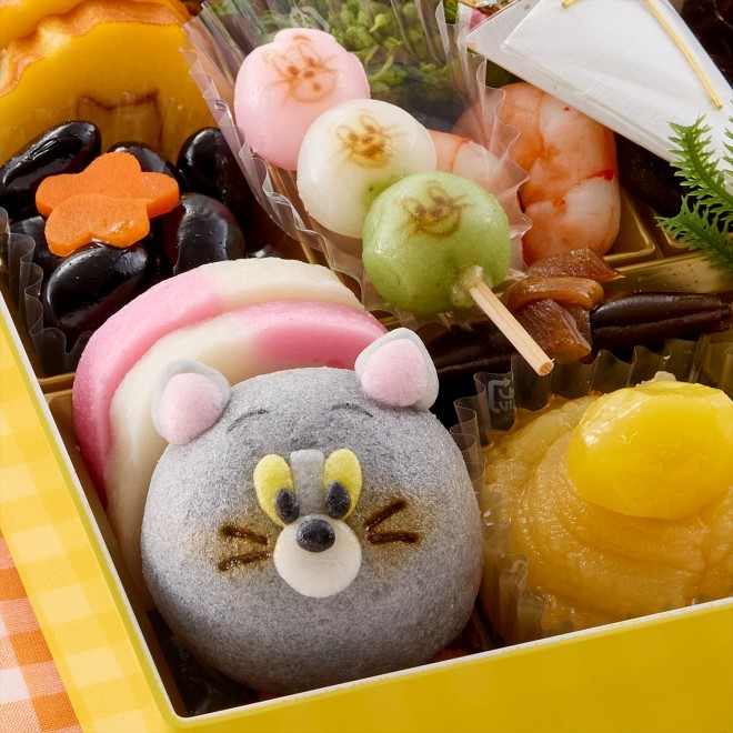 2026 two-tier Tom and Jerry Osechi set featuring traditional New Year dishes and cheese-inspired items.