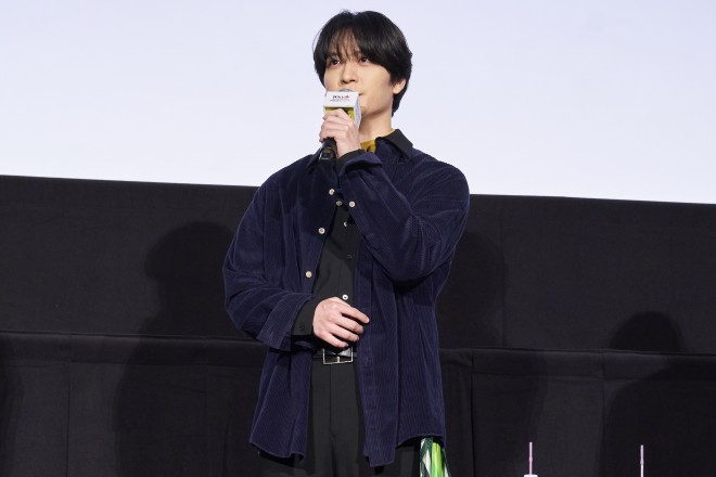 Voice actors of Mobile Suit Gundam: Iron-Blooded Orphans celebrating the 10th anniversary during a stage greeting event in Tokyo.