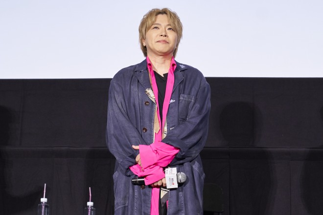 Voice actors of Mobile Suit Gundam: Iron-Blooded Orphans celebrating the 10th anniversary during a stage greeting event in Tokyo.